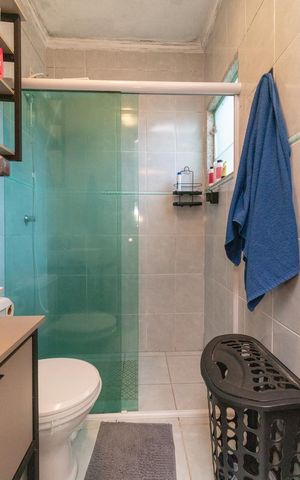 Casa de condomínio à venda com 53m², 3 quartos e 1 vagaBanheiro da Suíte