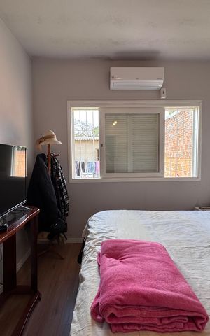 Casa à venda com 100m², 2 quartos e 2 vagas Casa à venda com 100m², 2 quartos e 2 vagasQuarto 1