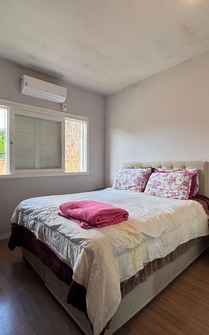 Casa à venda com 100m², 2 quartos e 2 vagas Casa à venda com 100m², 2 quartos e 2 vagasQuarto 1