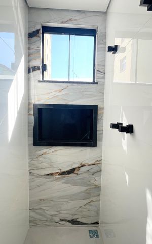Casa à venda com 130m², 3 quartos e 2 vagasBanheiro da Suíte