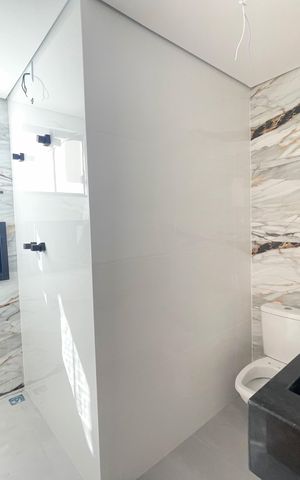 Casa à venda com 130m², 3 quartos e 2 vagasBanheiro da Suíte