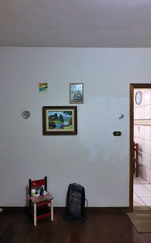 Casa à venda com 128m², 2 quartos e 2 vagasSala