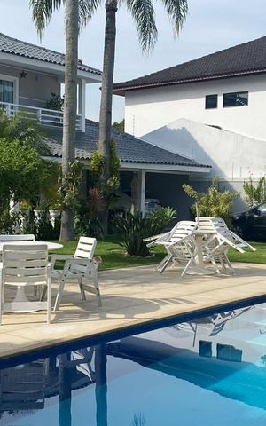 Casa de condomínio à venda com 530m², 5 quartos e 3 vagas Casa de condomínio à venda com 530m², 5 quartos e 3 vagasÁrea Externa