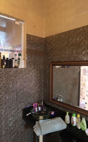 Casa de condomínio à venda com 81m², 3 quartos e 2 vagasBanheiro da Suíte