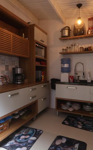 Casa de condomínio à venda com 81m², 3 quartos e 2 vagasCozinha - Armários