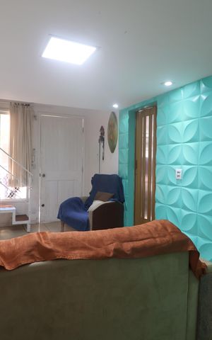 Casa de condomínio à venda com 81m², 3 quartos e 2 vagasSala