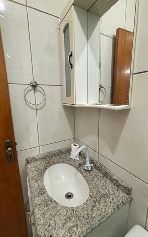 Casa à venda com 100m², 2 quartos e 2 vagas Casa à venda com 100m², 2 quartos e 2 vagasBanheiro da Suíte 1