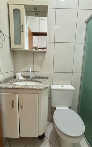 Casa à venda com 100m², 2 quartos e 2 vagas Casa à venda com 100m², 2 quartos e 2 vagasBanheiro da Suíte 1