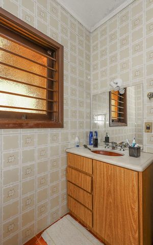 Casa à venda com 308m², 3 quartos e 4 vagasBanheiro da Suíte