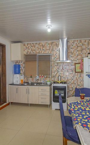 Casa à venda com 150m², 2 quartos e 5 vagas Casa à venda com 150m², 2 quartos e 5 vagasCozinha