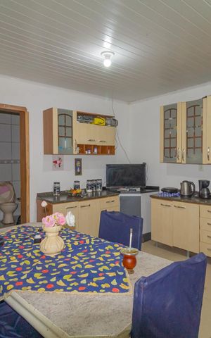 Casa à venda com 150m², 2 quartos e 5 vagas Casa à venda com 150m², 2 quartos e 5 vagasCozinha