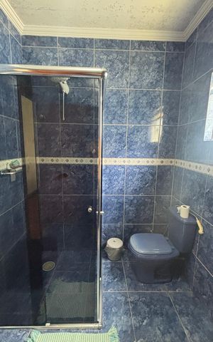 Casa à venda com 246m², 4 quartos e 2 vagas Casa à venda com 246m², 4 quartos e 2 vagasBanheiro
