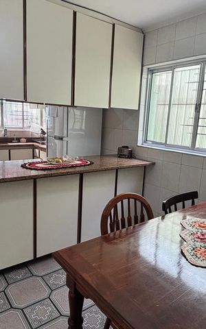 Casa à venda com 246m², 4 quartos e 2 vagas Casa à venda com 246m², 4 quartos e 2 vagasCozinha