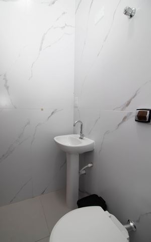 Casa à venda com 306m², 4 quartos e 5 vagas Casa à venda com 306m², 4 quartos e 5 vagasBanheiro de Serviço