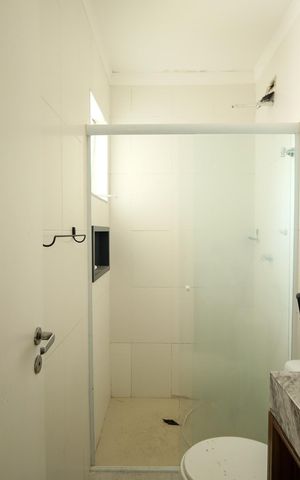 Casa de condomínio à venda com 120m², 3 quartos e 3 vagas Casa de condomínio à venda com 120m², 3 quartos e 3 vagasBanheiro da Suíte