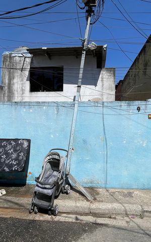 Casa à venda com 78m², 2 quartos e 2 vagas Casa à venda com 78m², 2 quartos e 2 vagasFachada