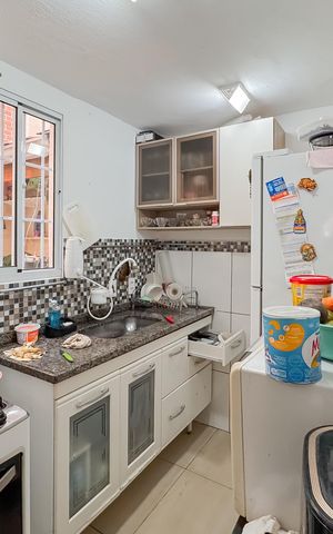 Casa à venda com 79m², 2 quartos e sem vaga Casa à venda com 79m², 2 quartos e sem vagaCozinha