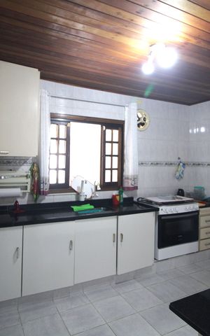 Casa à venda com 90m², 2 quartos e 2 vagasCozinha