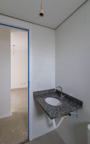 Apartamento à venda com 64m², 2 quartos e 1 vaga Apartamento à venda com 64m², 2 quartos e 1 vagaBanheiro Social