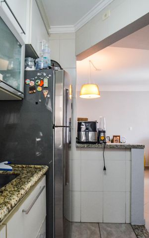 Apartamento à venda com 54m², 2 quartos e 1 vaga Apartamento à venda com 54m², 2 quartos e 1 vagaCozinha e Área de Serviço