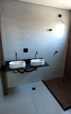Casa à venda com 91m², 2 quartos e 2 vagas Casa à venda com 91m², 2 quartos e 2 vagasBanheiro do Quarto 1