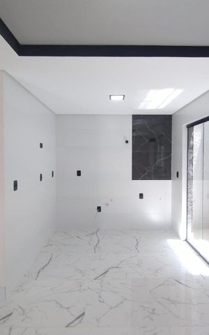 Casa à venda com 80m², 2 quartos e 2 vagas Casa à venda com 80m², 2 quartos e 2 vagasSala