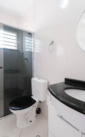 Casa à venda com 96m², 2 quartos e 2 vagasBanheiro da Suíte 2