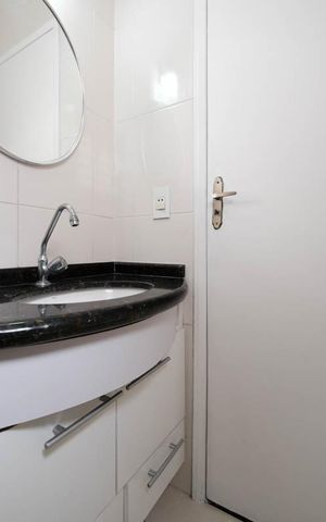 Casa à venda com 96m², 2 quartos e 2 vagasBanheiro da Suíte 1