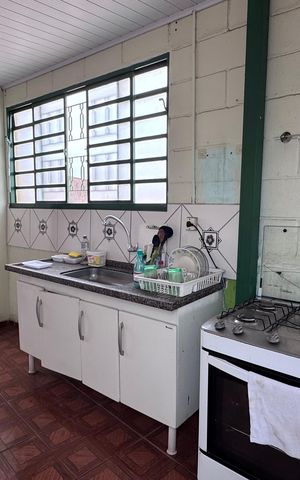 Casa à venda com 293m², 5 quartos e 4 vagas Casa à venda com 293m², 5 quartos e 4 vagasCozinha