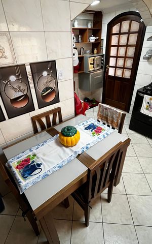 Casa à venda com 150m², 3 quartos e 2 vagas Casa à venda com 150m², 3 quartos e 2 vagasCozinha