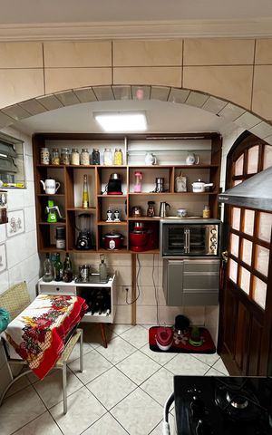 Casa à venda com 150m², 3 quartos e 2 vagas Casa à venda com 150m², 3 quartos e 2 vagasCozinha