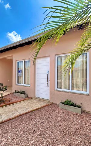 Casa à venda com 176m², 3 quartos e 4 vagas Casa à venda com 176m², 3 quartos e 4 vagasFachada