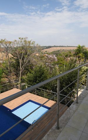 Casa de condomínio para alugar com 620m², 5 quartos e 8 vagasQuarto Suíte 2 - Sacada
