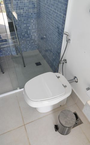 Casa de condomínio para alugar com 620m², 5 quartos e 8 vagasBanheiro da Piscina