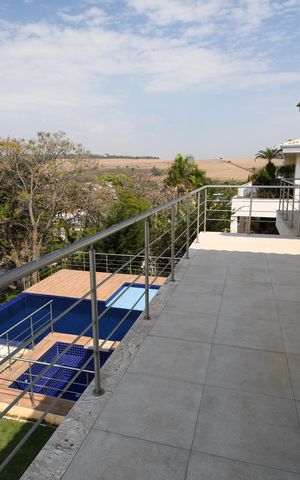 Casa de condomínio para alugar com 620m², 5 quartos e 8 vagasQuarto Suíte 3 - Sacada