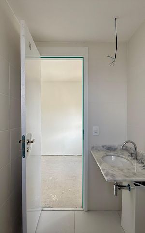 Apartamento à venda com 77m², 2 quartos e 1 vaga Apartamento à venda com 77m², 2 quartos e 1 vagaBanheiro Suíte 1