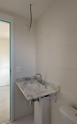Apartamento à venda com 77m², 2 quartos e 1 vaga Apartamento à venda com 77m², 2 quartos e 1 vagaBanheiro Suíte 1