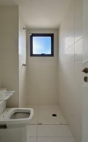 Apartamento à venda com 77m², 2 quartos e 1 vaga Apartamento à venda com 77m², 2 quartos e 1 vagaBanheiro Suíte 1