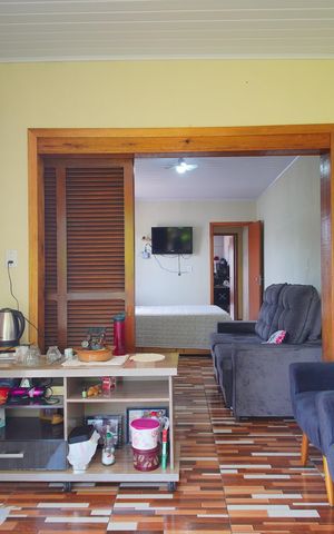 Casa à venda com 200m², 4 quartos e 1 vagaÁrea de Serviço