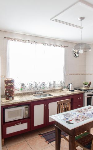 Casa à venda com 115m², 4 quartos e 3 vagas Casa à venda com 115m², 4 quartos e 3 vagasCozinha