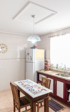 Casa à venda com 115m², 4 quartos e 3 vagas Casa à venda com 115m², 4 quartos e 3 vagasCozinha
