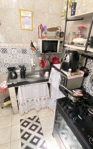 Casa à venda com 85m², 2 quartos e 1 vaga Casa à venda com 85m², 2 quartos e 1 vagaCozinha