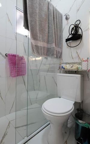 Casa de condomínio à venda com 91m², 2 quartos e 1 vagaBanheiro da Suíte 2