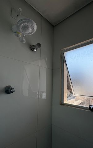 Casa à venda com 112m², 2 quartos e 2 vagas Casa à venda com 112m², 2 quartos e 2 vagasBanheiro da suíte 2