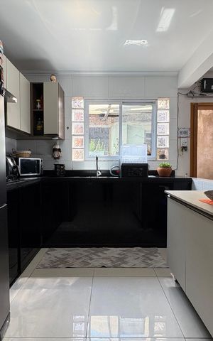 Casa à venda com 112m², 2 quartos e 2 vagas Casa à venda com 112m², 2 quartos e 2 vagasCozinha