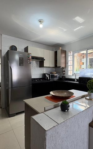 Casa à venda com 112m², 2 quartos e 2 vagas Casa à venda com 112m², 2 quartos e 2 vagasCozinha