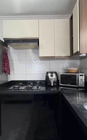 Casa à venda com 112m², 2 quartos e 2 vagas Casa à venda com 112m², 2 quartos e 2 vagasCozinha