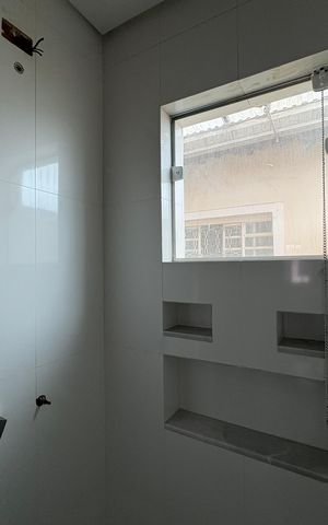Casa à venda com 424m², 3 quartos e 6 vagas Casa à venda com 424m², 3 quartos e 6 vagasBanheiro da Suíte 2