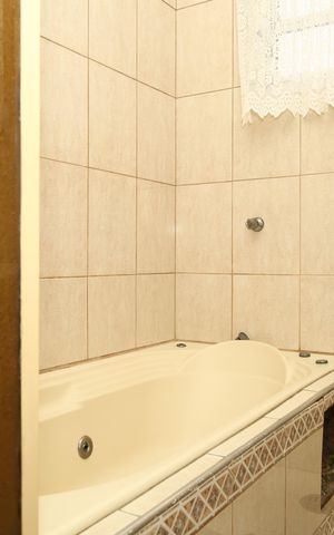 Casa à venda com 300m², 4 quartos e 3 vagasBanheiro da Suíte