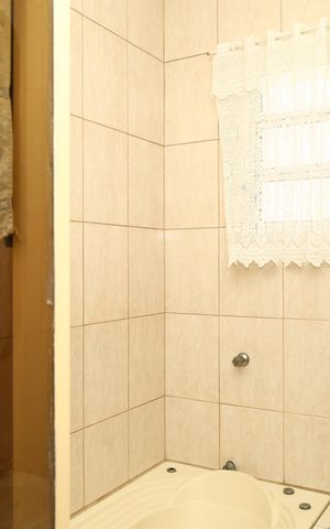 Casa à venda com 300m², 4 quartos e 3 vagasBanheiro da Suíte